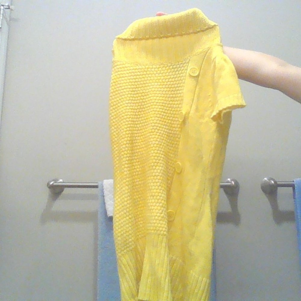 girls yellow sweater dress from the brand DOLLHOUSE